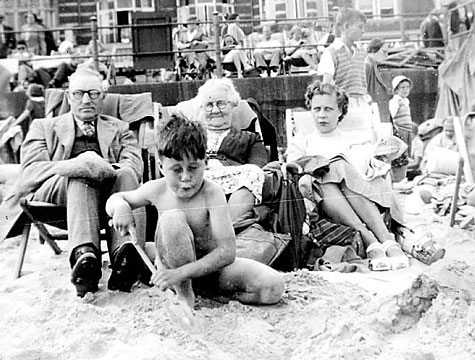Happy Days! The Editor of Dorset Ancestors pictured on Weymouth beach with his mother and grand parents,  George and Fanny (Trent) Chisman. About 1950.