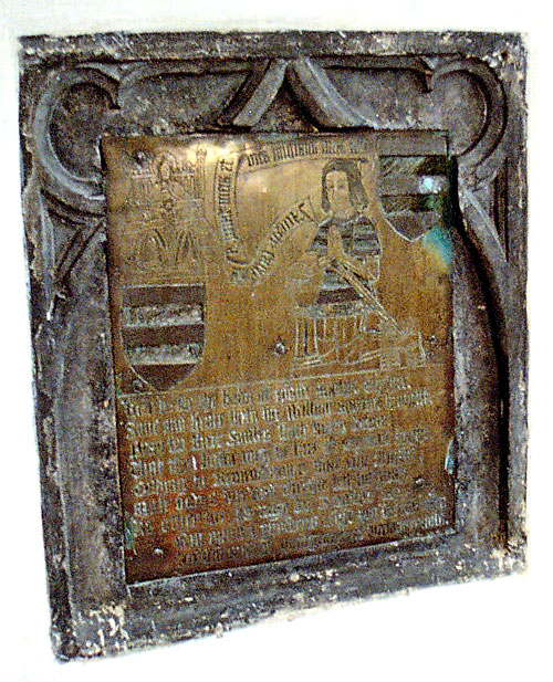 This wall mounted monument is set in the wall of the south chapel.
