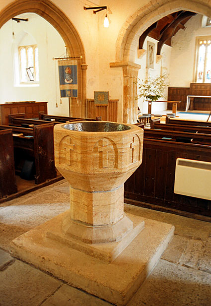 Photo: Font and interior of church