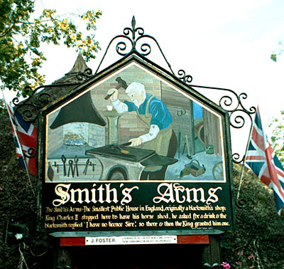 The sign over the entrance to the Smith's Arms at Godmanstone.