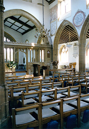 A view inside the church from the north aisle looking across to the chancel.