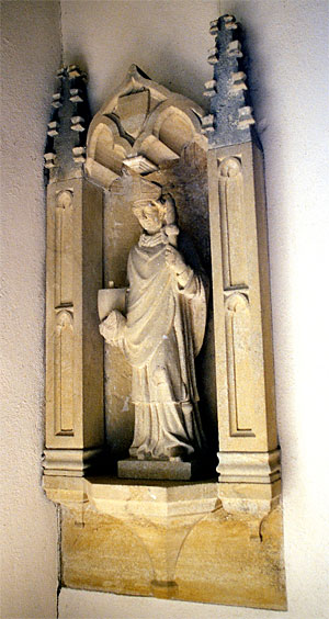 This beautifully carved statue of St. Nicholas is believed to be 15th century and is in the north chapel.