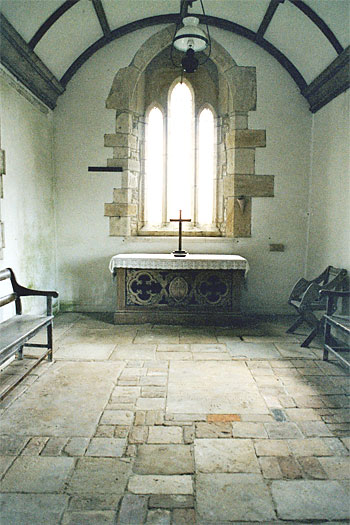 The Chancel.  The altar came from Dorchester Holy Trinity; for some reason the original Whitcombe altar has been moved to Stockwood.