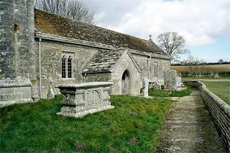 The churchyard is partly surrounded by an 18th century boundary wall.