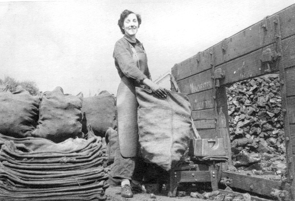 In 1954 Irene Stockley of Corfe Castle, pictured here, appeared on the TV show ‘What’s My Line.’ The celebrity panel failed to guess her occupation – she delivered coal!