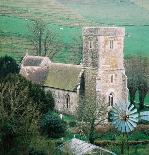 St. Peter's Church at Long Bredy. Photo by Chris Downer, please click on the photo for more about the photographer.