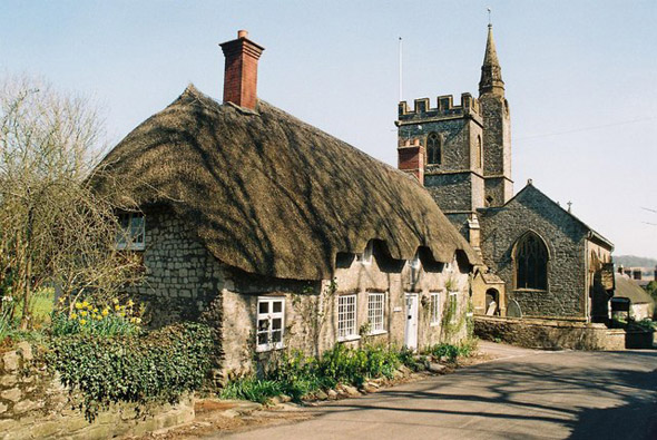Tess Cottage and Church at Evershot. Photo by Chris Downer, for more about Chris Downer please click on the image.