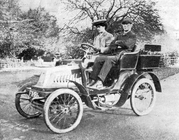 We believe this is a photo of Edwin and Jane Childs with one of his hire fleet.
