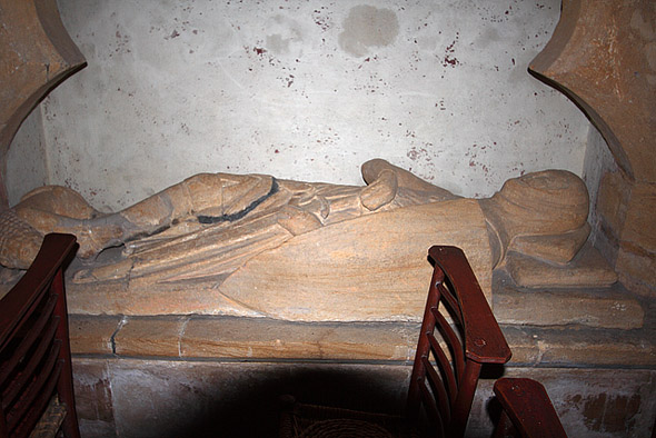 Crusader Effigy Church of St Barnabas - Stock Gaylard. C13 effigy in the south wall of the nave, believed to be the crusader knight Sir Ingelramus de Waleys, whose dismembered body was assumed to have been brought back from the Holy Land for burial in his native place. Certainly a dismembered skeleton was found here during the church's restoration in 1884, and was subsequently re-buried in a new wooden coffin bearing the red cross of the Knights Templar. Photo by Mike Searle, for more about the photographer please click on the image.